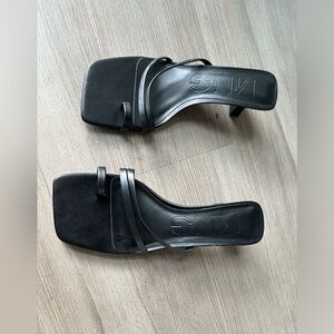 Heeled leather sandals with straps